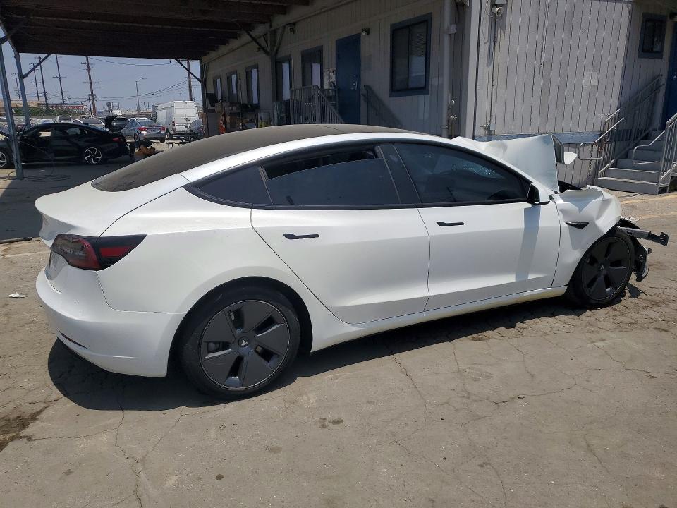 2023 Tesla VIN 5YJ3E1EAXPF502676 COPART salvage auction — FRONT END, Salvage Title, sold $5,100 on 2026-07-13 (photo 3)