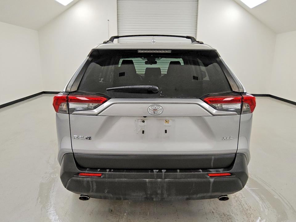 2019 Toyota Rav4 VIN JTMW1RFVXKD032156 COPART salvage auction — MINOR DENT/SCRATCHES, Tx - Certificate Of Title, sold $17,200 on 2026-07-09 (photo 6)