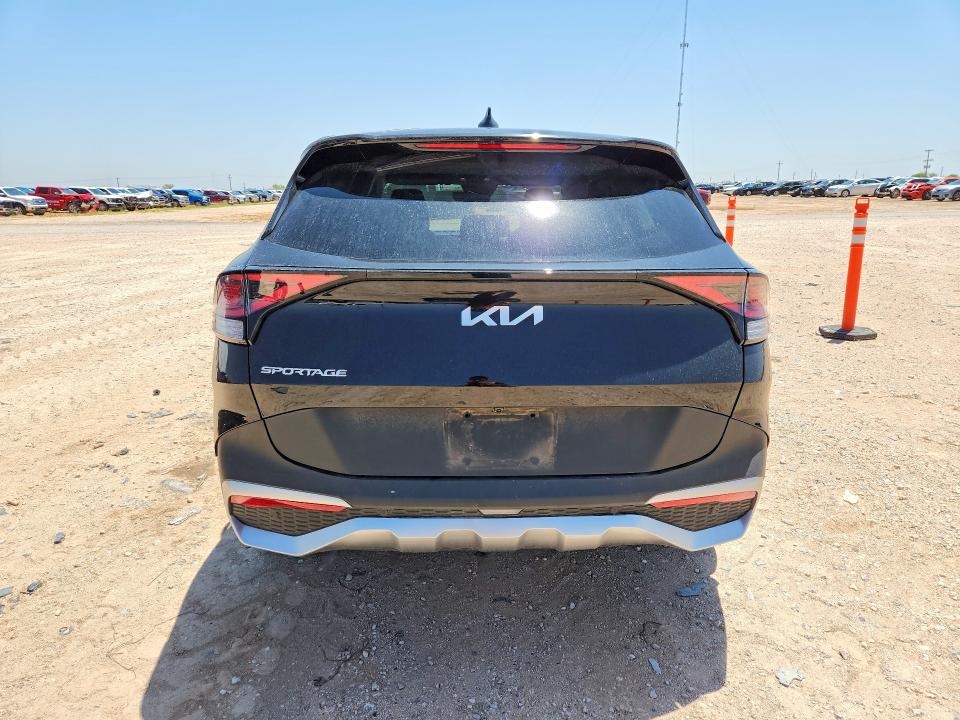 2023 Kia Sportage VIN 5XYK33AF9PG058911 COPART salvage auction — SIDE, TX - SALVAGE VEHICLE TITLE, sold $7,600 on 2026-07-22 (photo 6)