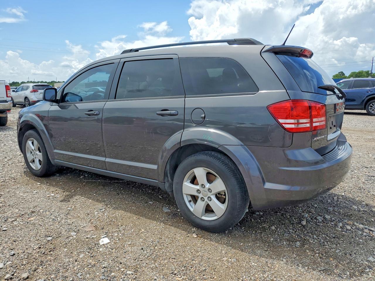 2016 Dodge Journey VIN 3C4PDCAB4GT132454 COPART salvage auction — Side, TX - SALVAGE VEHICLE TITLE, sold $1,200 on 2026-07-09 (photo 2)