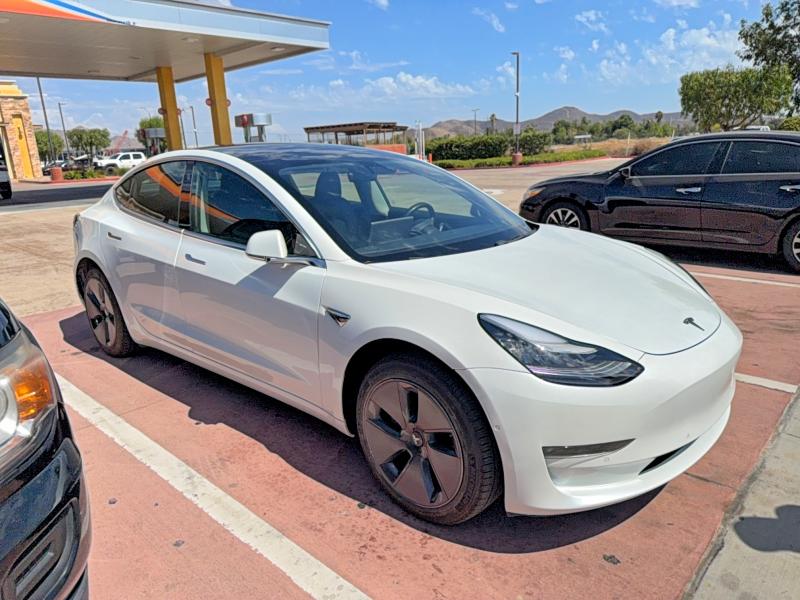 2019 Tesla Model 3 VIN 5YJ3E1EA0KF431223 — COPART salvage auction photo