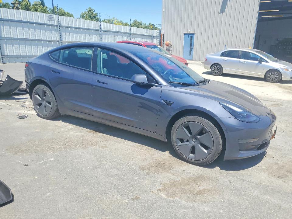 2023 Tesla Model 3 VIN 5YJ3E1EA5PF674663 COPART salvage auction — REAR END, Ca - Salvage Certificate, sold $10,700 on 2026-07-02 (photo 4)