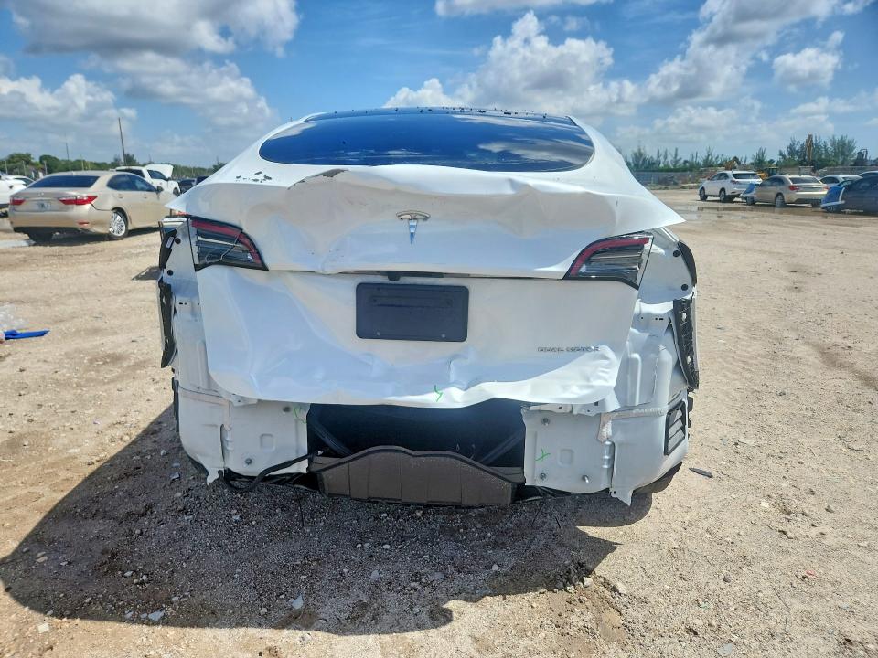 2024 Tesla Model y VIN 7SAYGDEE0RA246992 COPART salvage auction — REAR END, Salvage Title, sold $11,800 on 2026-07-16 (photo 6)