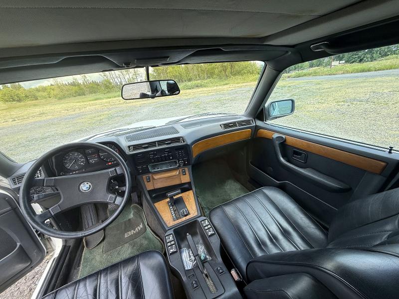 1985 BMW 7 series VIN WBAFJ910608751757 COPART salvage auction — MINOR DENT/SCRATCHES, Or - Certificate Of Title (P), sold $5,800 on 2026-07-13 (photo 9)
