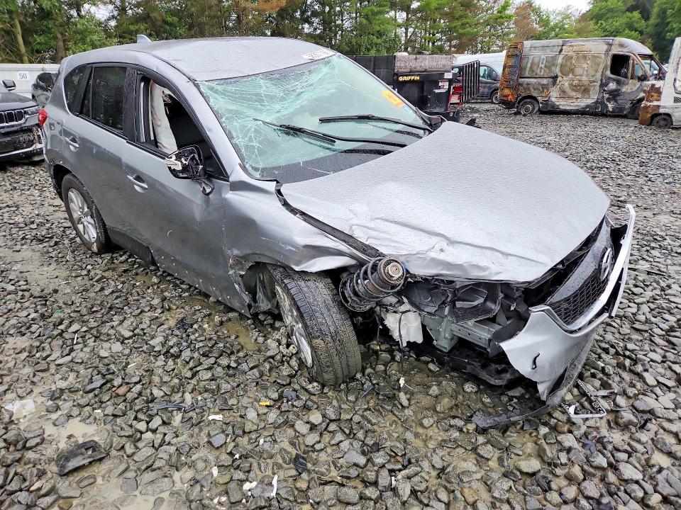 2015 Mazda Cx-5 VIN JM3KE4CY0F0477658 COPART salvage auction — ALL OVER, NJ - CERT OF TITLE-SALVAGE, sold $425 on 2026-07-29 (photo 4)