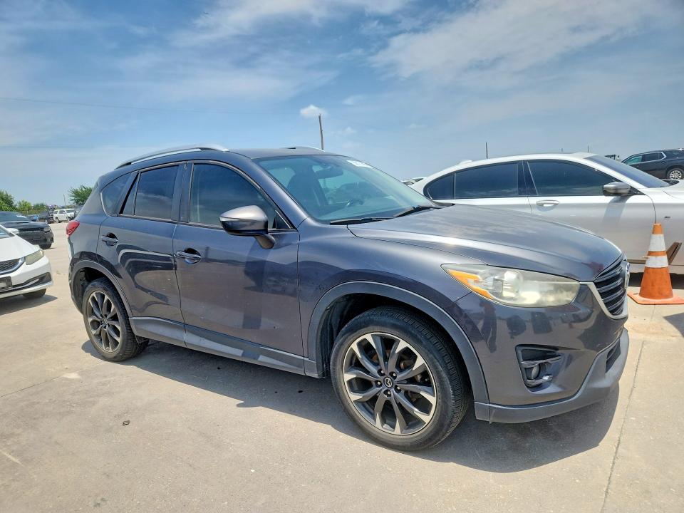 2016 Mazda VIN JM3KE2DY9G0810329 COPART salvage auction — HAIL, Tx - Certificate Of Title, sold $2,200 on 2026-07-27 (photo 4)
