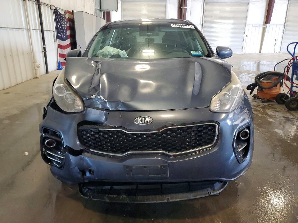 2018 Kia Sportage VIN KNDPMCAC7J7346360 COPART salvage auction — FRONT END, MN - CERT OF TITLE-PRIOR SALVAGE, sold $1,400 on 2026-07-27 (photo 5)