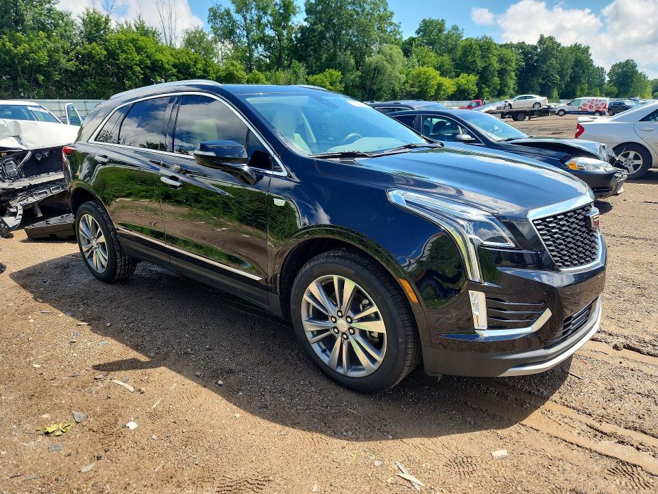 2020 Cadillac Xt5 VIN 1GYKNDRS2LZ154869 COPART salvage auction — REAR END, Mi - Certificate Of Title, sold $8,500 on 2026-08-05 (photo 4)