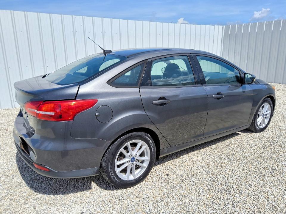 2016 Ford Focus VIN 1FADP3F23GL390825 COPART salvage auction — REAR END, Fl - Certificate Of Title, sold $125 on 2026-07-07 (photo 3)