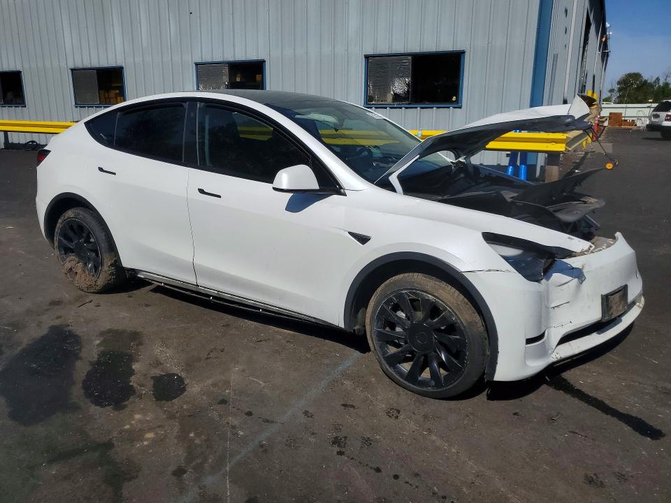 2023 Tesla Model y VIN 7SAYGDEEXPF637972 COPART salvage auction — FRONT END, Or - Wrecker's Notice (Parts Only), sold $6,100 on 2026-07-27 (photo 4)