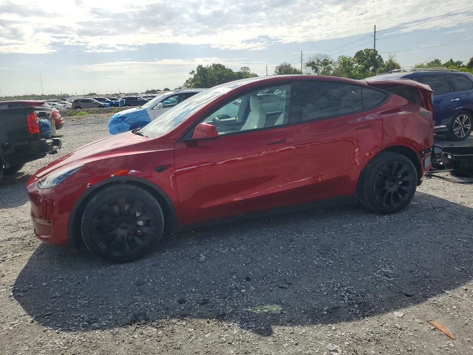 2025 Tesla Model y VIN 7SAYGDEE6SA352627 COPART salvage auction — REAR END, Fl - Cert Of Title Slvg Rebuildable, sold $14,300 on 2026-07-06 (photo 1)