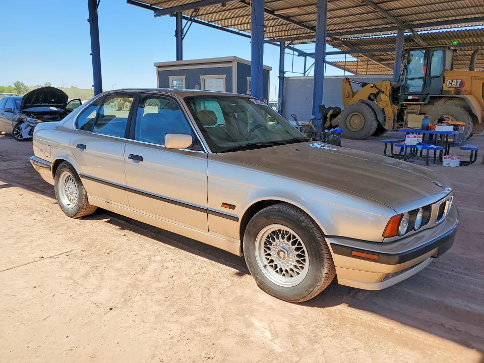 1995 BMW 5 series VIN WBAHD6326SGK56674 COPART salvage auction — MINOR DENT/SCRATCHES, Az - Cert Of Title-Restored Salvage, sold $2,200 on 2026-07-02 (photo 4)