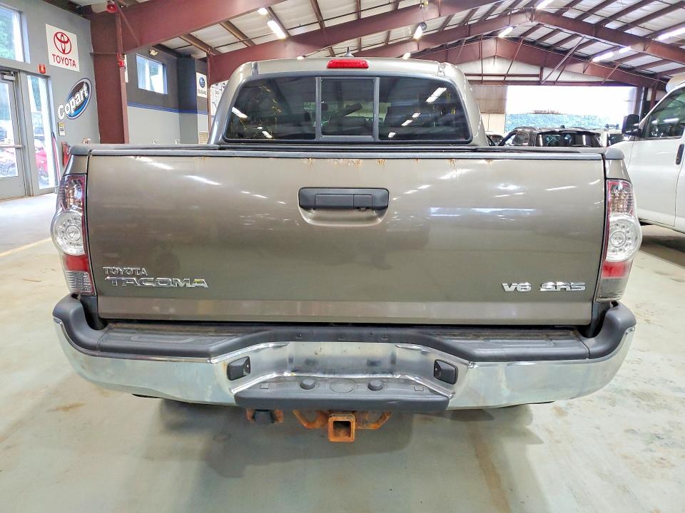 2014 Toyota Tacoma VIN 3TMLU4EN7EM138264 COPART salvage auction — MINOR DENT/SCRATCHES, NY - CERTIFICATE OF TITLE, sold $9,000 on 2026-07-31 (photo 6)