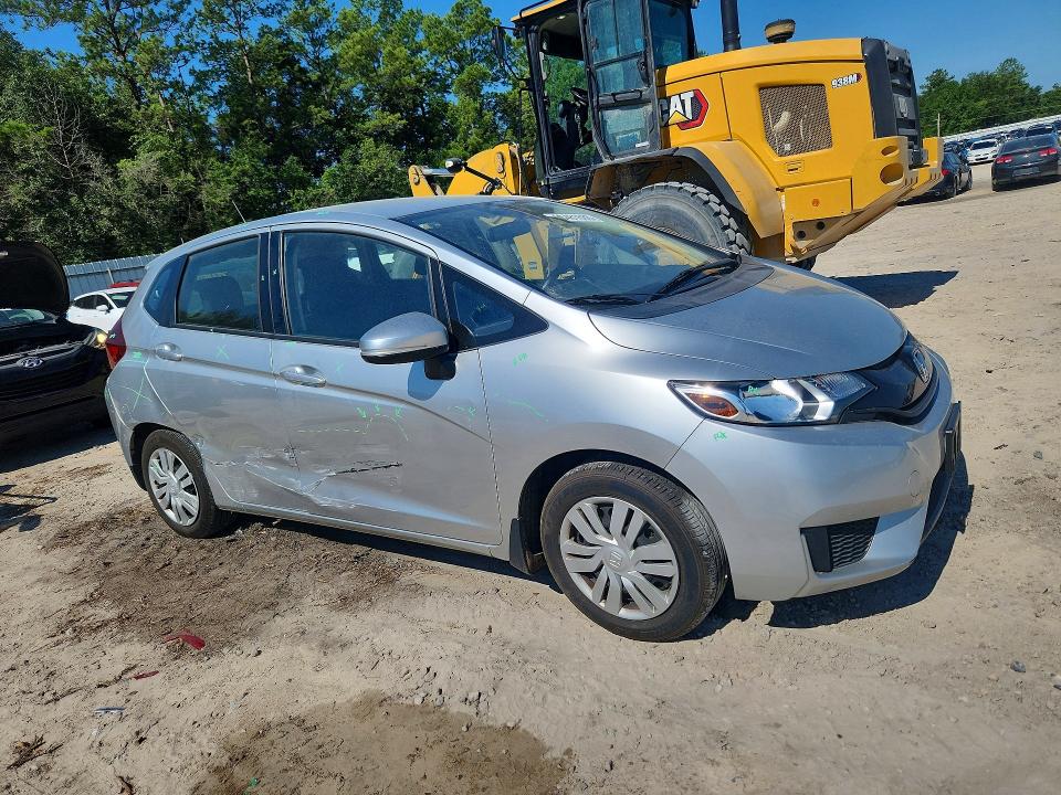 2016 Honda Fit VIN JHMGK5H55GX036739 COPART salvage auction — SIDE, Fl - Cert Of Title Slvg Rebuildable, sold $2,900 on 2026-07-10 (photo 4)