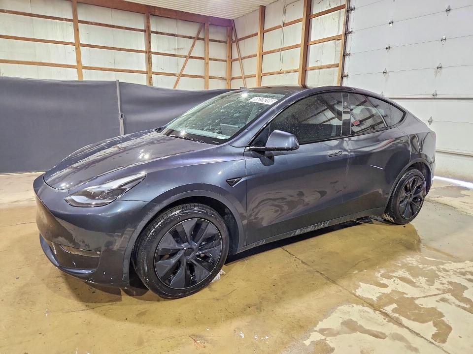 2025 Tesla Model y VIN 7SAYGDEE7SF289184 COPART salvage auction — HAIL, Oh - Certificate Of Title, sold $18,000 on 2026-07-09 (photo 1)