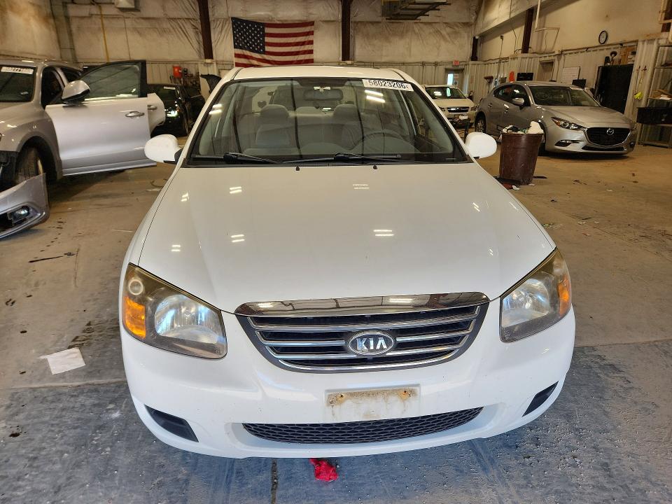 2009 Kia Spectra VIN KNAFE221795613517 COPART salvage auction — HAIL, Wi - Certificate Of Title, sold $275 on 2026-07-08 (photo 5)