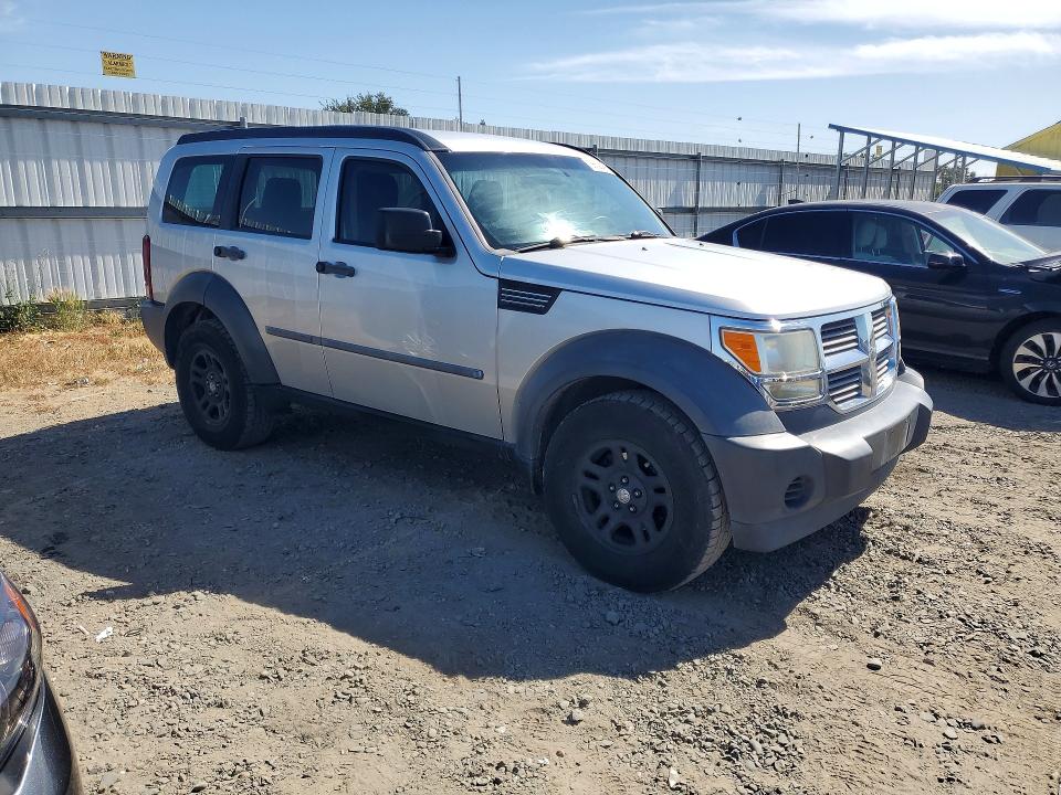 2007 Dodge Nitro VIN 1D8GT28K17W556317 COPART salvage auction — SIDE, Nv - Dis/Dlr/Exp Only Clean Title, sold $700 on 2026-07-02 (photo 4)