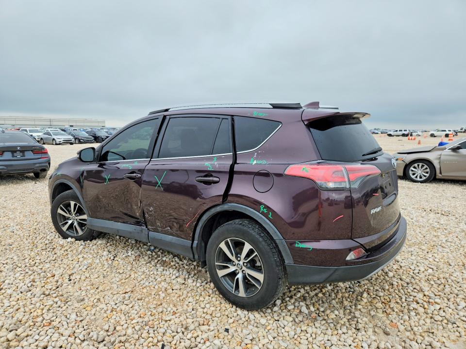 2018 Toyota Rav 4 VIN 2T3WFREV7JW425424 COPART salvage auction — SIDE, Tx - Salvage Vehicle Title, sold $550 on 2026-07-30 (photo 2)