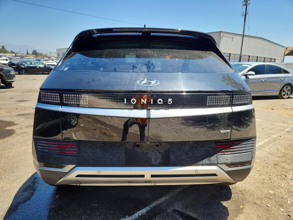 2023 Hyundai Ioniq 5 VIN KM8KNDAF6PU228636 COPART salvage auction — UNDERCARRIAGE, Ca - Non-Repairable Vehicle Cert, sold $4,250 on 2026-07-20 (photo 6)