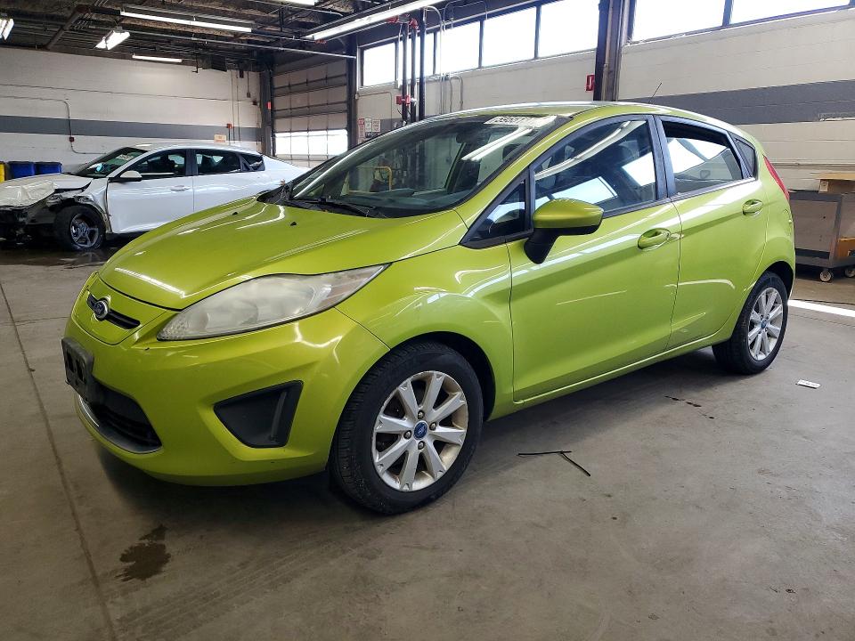 2012 Ford Fiesta VIN 3FADP4EJ9CM101860 COPART salvage auction — MINOR DENT/SCRATCHES, Il - Certificate Of Title, sold $325 on 2026-07-09 (photo 1)