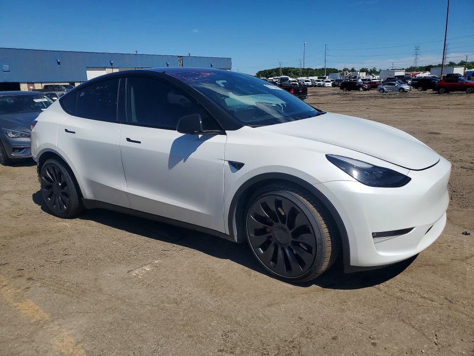 2023 Tesla Model y VIN 7SAYGDEF0PF860093 COPART salvage auction — REAR END, Mi - Cert Of Title-Salvage Vehicle, sold $3,600 on 2026-07-28 (photo 4)