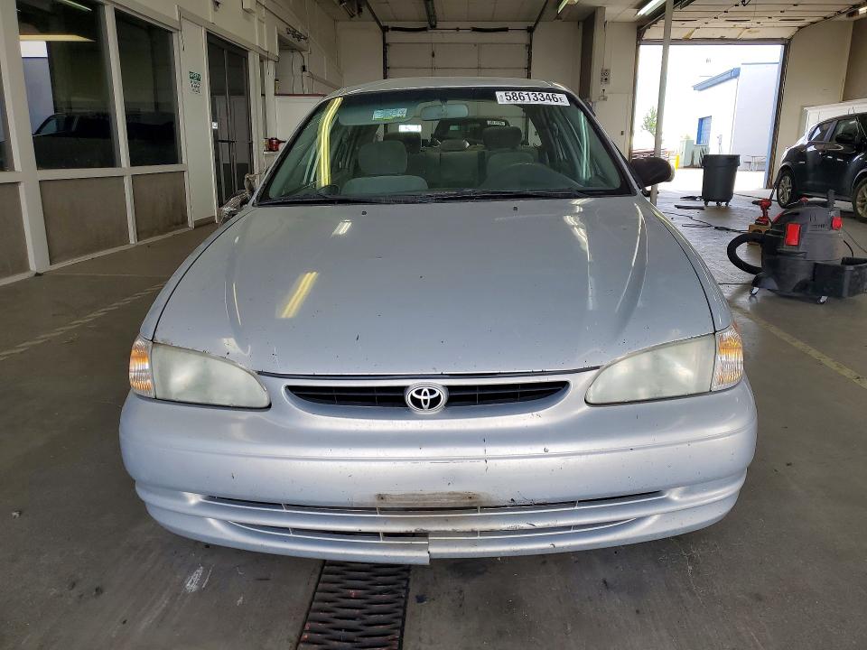 2000 Toyota Corolla VIN 1NXBR12E8YZ407044 COPART salvage auction — ROLLOVER, WA - BILL OF SALE, sold $275 on 2026-07-10 (photo 5)