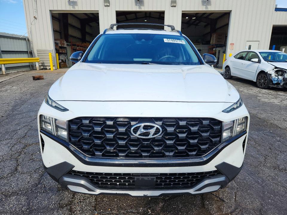 2022 Hyundai Santa fe VIN 5NMS64AJ7NH387806 COPART salvage auction — HAIL, Mo - Salvage Certificate Of Title, sold $7,600 on 2026-07-29 (photo 5)