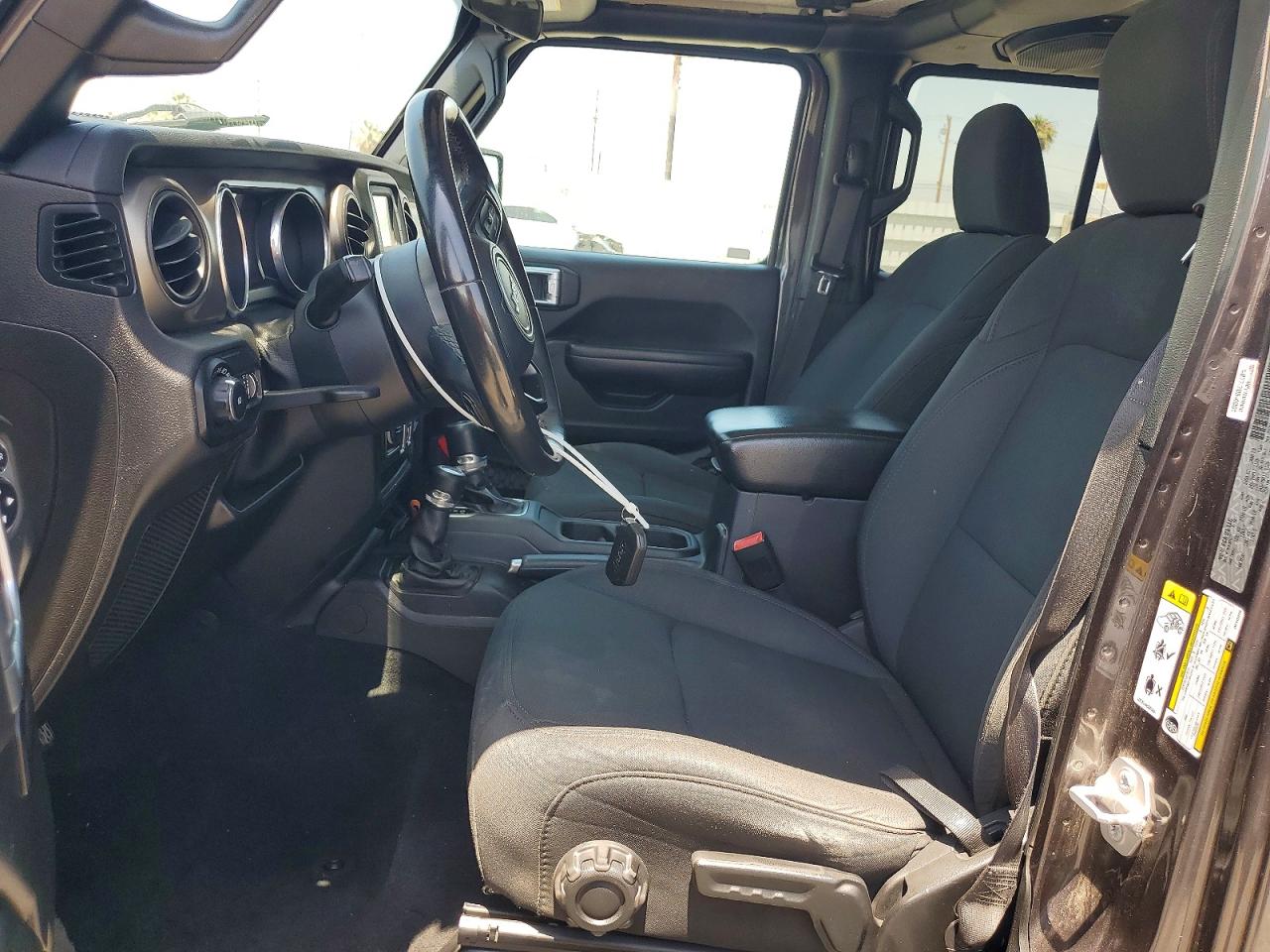 2018 Jeep Wrangler Unlimited VIN 1C4HJXDNXJW145348 COPART salvage auction — Minor Dent/Scratches, FL - DERELICT VEHICLE CERTIFICATE, sold $9,900 on 2026-07-02 (photo 7)