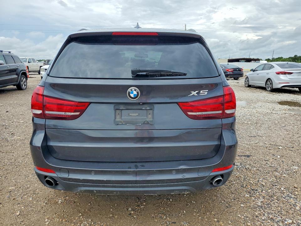 2015 BMW VIN 5UXKR0C59F0K69630 COPART salvage auction — MINOR DENT/SCRATCHES, Tx - Certificate Of Title (P), sold $1,100 on 2026-07-09 (photo 6)