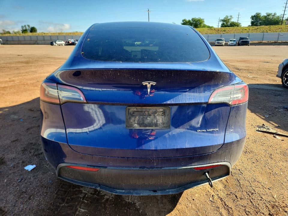 2022 Tesla Model y VIN 7SAYGDEE3NA011075 COPART salvage auction — ALL OVER, CO - SALVAGE TITLE, sold $6,600 on 2026-08-21 (photo 6)