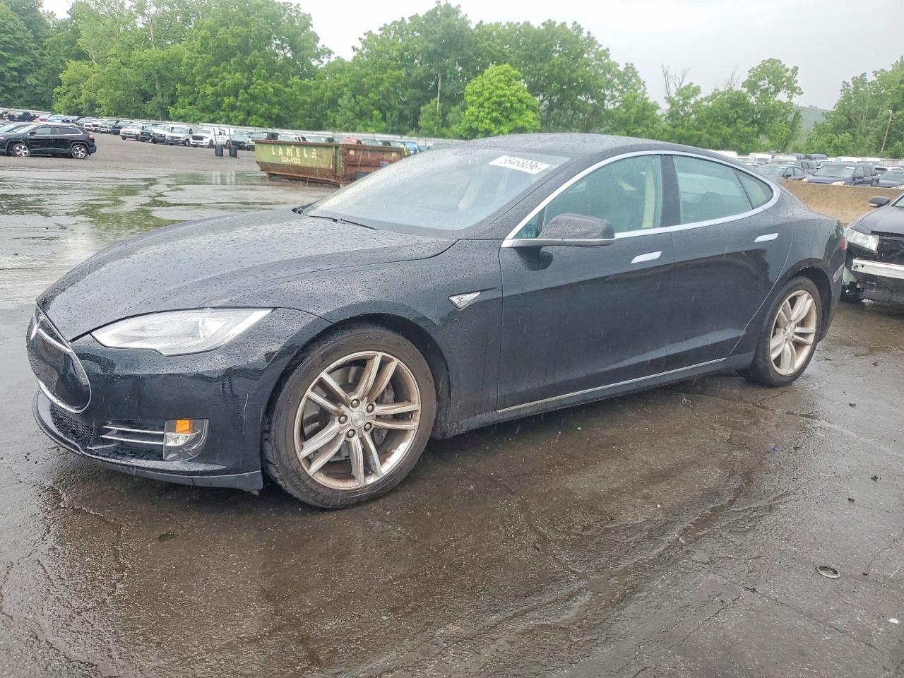 2014 Tesla Model S VIN 5YJSA1S12EFP41471 — COPART salvage auction photo