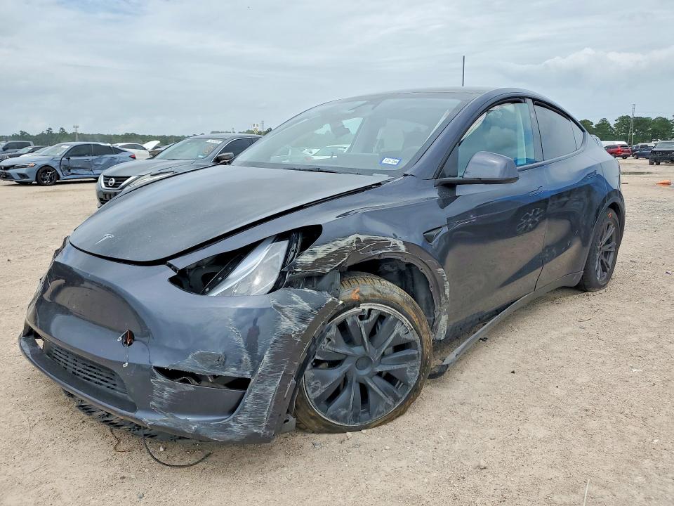 2025 Tesla Model y VIN 7SAYGDEE9SA353397 COPART salvage auction — FRONT END, TX - SALVAGE VEHICLE TITLE (P), sold $14,000 on 2026-07-17 (photo 1)
