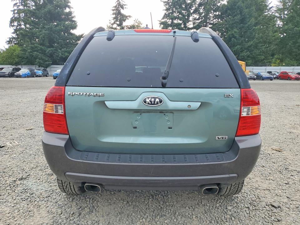 2006 Kia Sportage VIN KNDJE723767249482 COPART salvage auction — MECHANICAL, WA - VEHICLE CERT OF OWNERSHIP-TITL, sold $475 on 2026-07-24 (photo 6)
