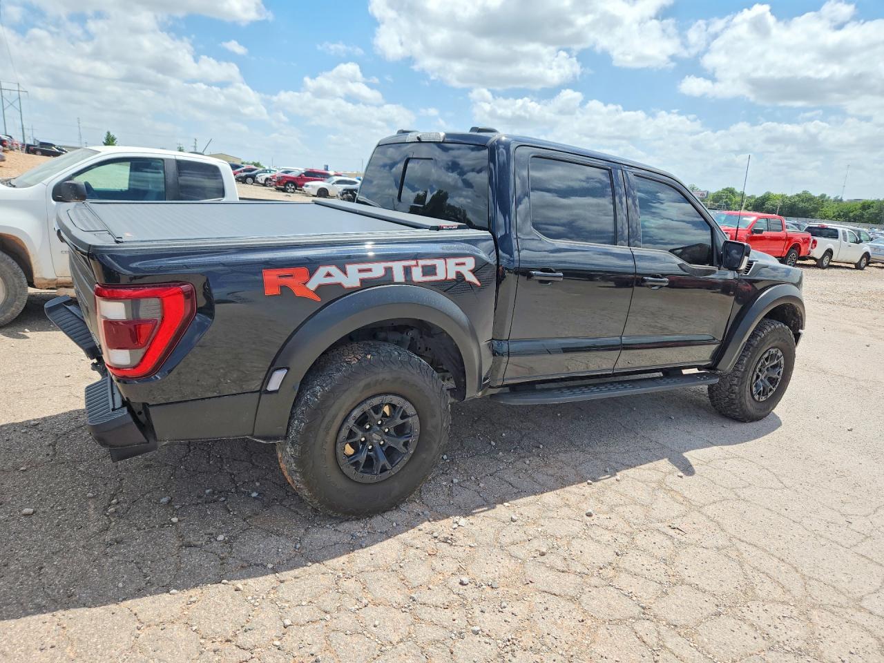 2023 Ford F-150 Lightning VIN 1FTFW1RJ4PFC92687 COPART salvage auction — Rear End, OK - CERT OF TITLE-SALVAGE, sold $76,000 on 2026-07-08 (photo 3)