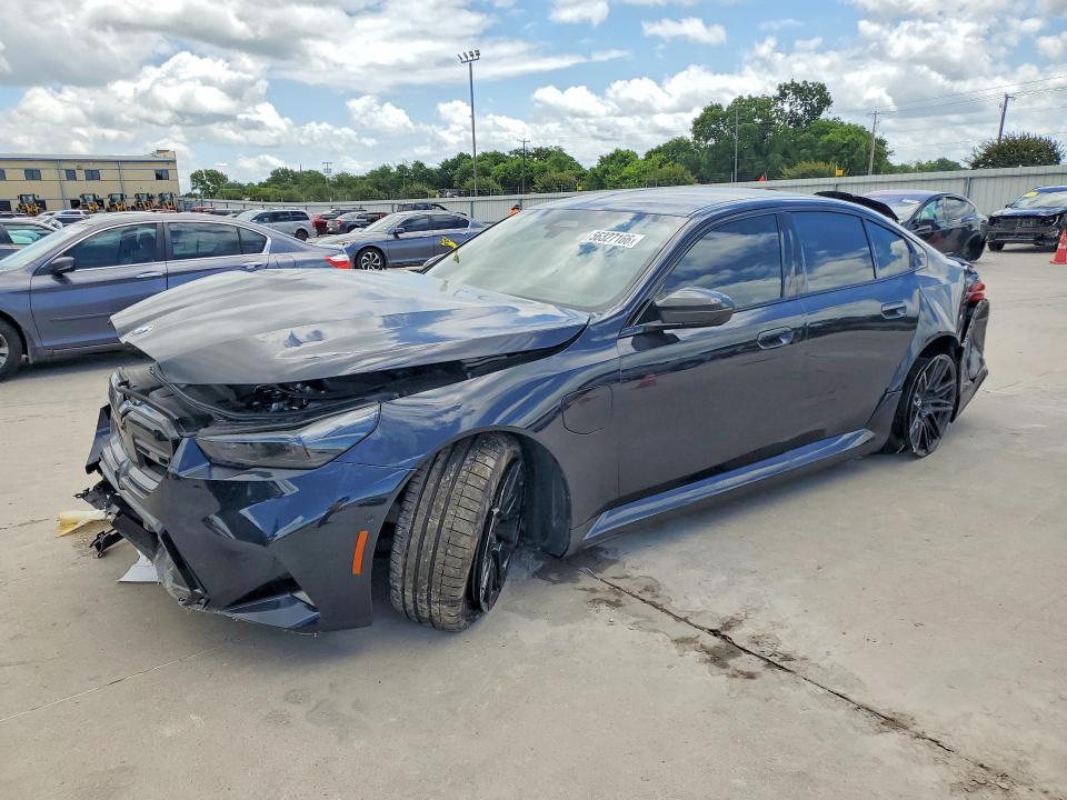 2026 BMW M5 VIN WBS83FK02TCW63513 COPART salvage auction — FRONT END, TX - SALVAGE VEHICLE TITLE, sold $56,500 on 2026-07-09 (photo 1)