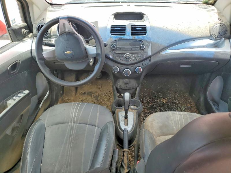 2015 Chevrolet VIN KL8CB6S90FC750407 COPART salvage auction — SIDE, Tx - Salvage Vehicle Title, sold $225 on 2026-07-29 (photo 8)