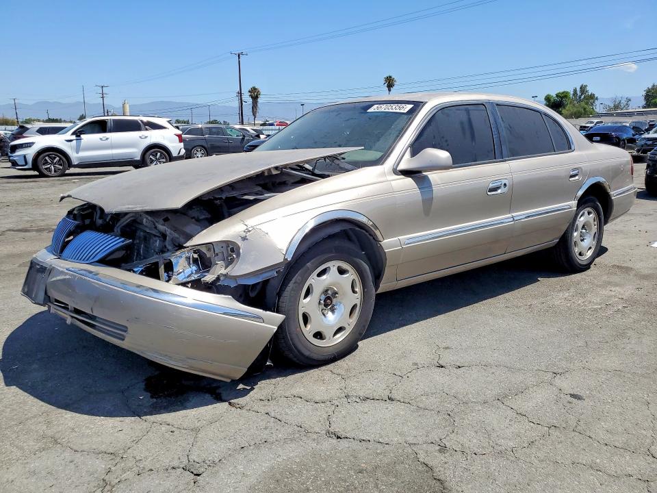 2000 Lincoln Continental VIN 1LNHM97V8YY829940 — COPART salvage auction photo