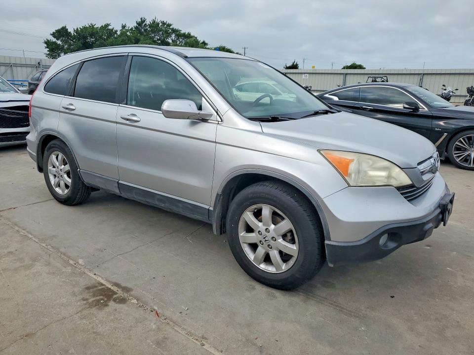 2009 Honda Cr-v VIN JHLRE38719C003158 COPART salvage auction — WATER/FLOOD, TX - SALVAGE TITLE-FLOOD DAMAGE (P), sold $600 on 2026-07-23 (photo 4)
