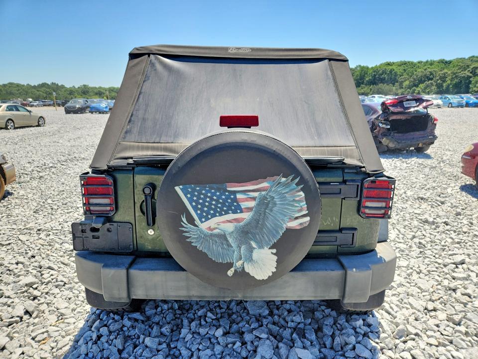 2009 Jeep Wrangler / VIN 1J4GB39179L753990 COPART salvage auction — FRONT END, GA - CERT OF TITLE-SALVAGE, sold $1,500 on 2026-08-02 (photo 6)