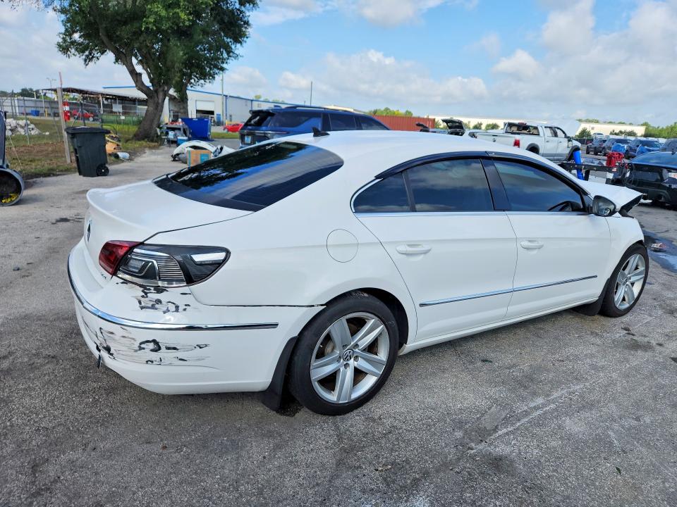 2014 Volkswagen VIN WVWBP7AN2EE537874 COPART salvage auction — FRONT END, Fl - Cert Of Title Slvg Rebuildable, sold $450 on 2026-08-06 (photo 3)