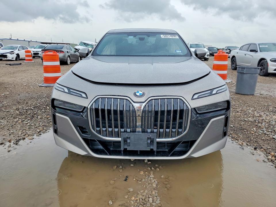2024 BMW VIN WBA33EJ00RCR45958 COPART salvage auction — SIDE, TX - SALVAGE VEHICLE TITLE (P), sold $37,250 on 2026-07-16 (photo 5)