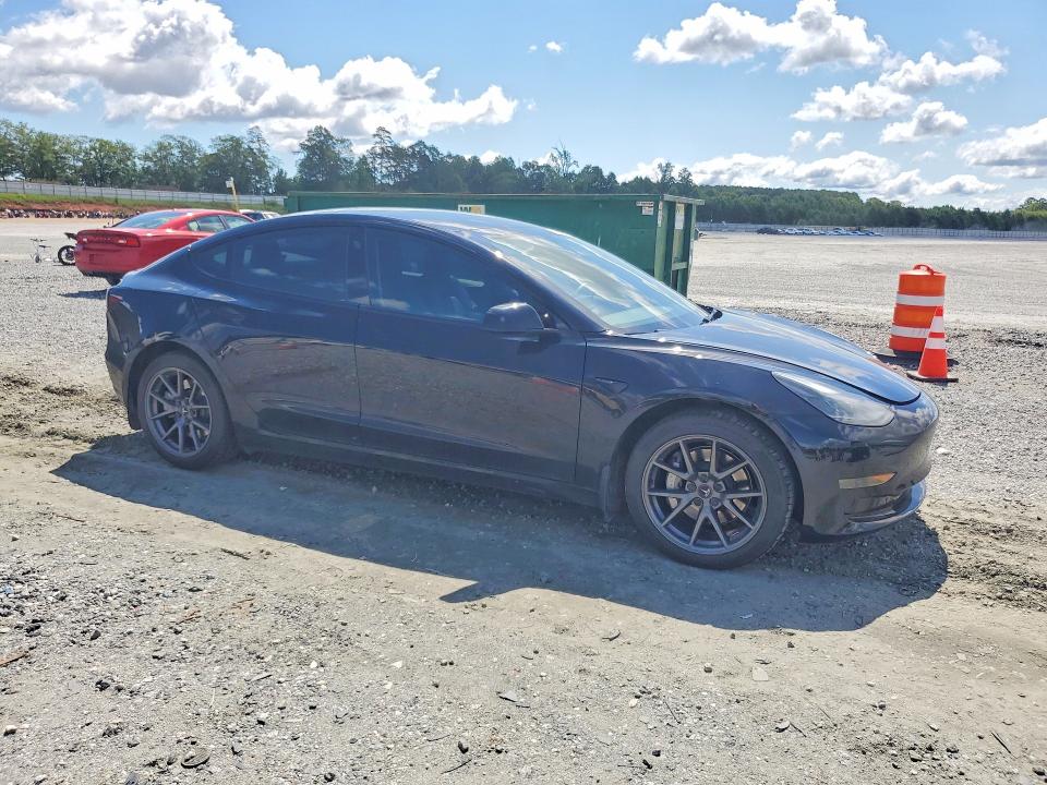 2023 Tesla VIN 5YJ3E1EA2PF571622 COPART salvage auction — SIDE, Sc - Cert Of Title-Salvage, sold $11,500 on 2026-07-27 (photo 4)