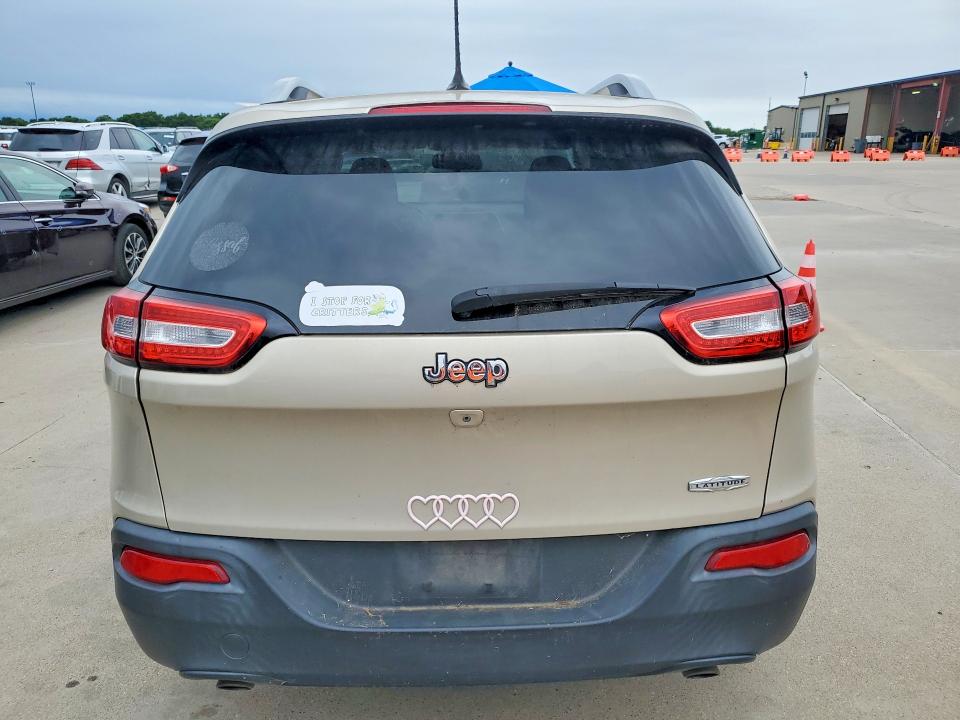 2014 Jeep Cherokee VIN 1C4PJLCS2EW297397 COPART salvage auction — SIDE, Tx - Certificate Of Title, sold $1,100 on 2026-07-09 (photo 6)