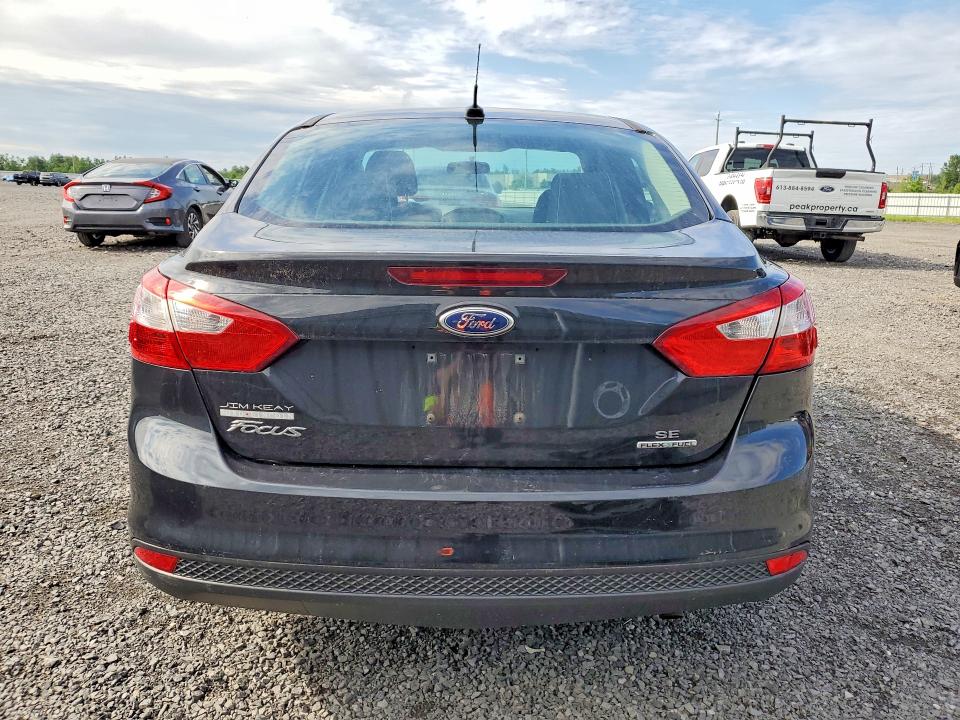 2014 Ford VIN 1FADP3F29EL342890 COPART salvage auction — MINOR DENT/SCRATCHES, On - Permit No Brand - Unfit, sold $1,600 on 2026-07-03 (photo 6)