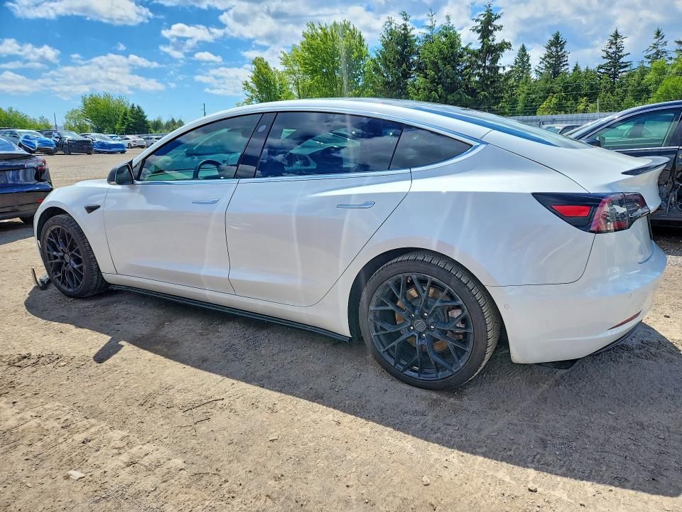 2020 Tesla Model 3 VIN 5YJ3E1EB4LF643200 COPART salvage auction — SIDE, On - Permit No Brand - Unfit, sold $9,200 on 2026-07-02 (photo 2)