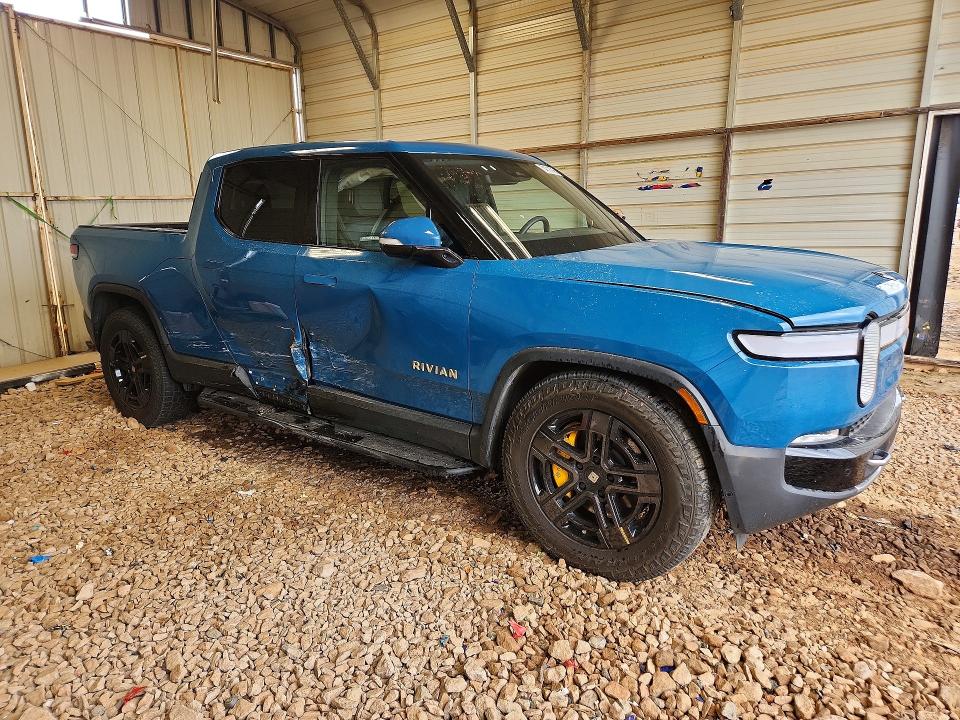 2023 Rivian VIN 7FCTGAAAXPN026117 COPART salvage auction — SIDE, Nc - Salvage Certificate Of Title, sold $8,000 on 2026-07-27 (photo 4)