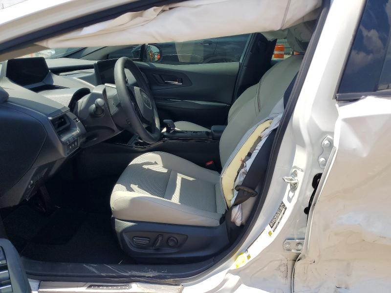 2023 Toyota Prius VIN JTDACAAU0P3011687 COPART salvage auction — SIDE, TX - SALVAGE VEHICLE TITLE (P), sold $7,000 on 2026-07-23 (photo 7)