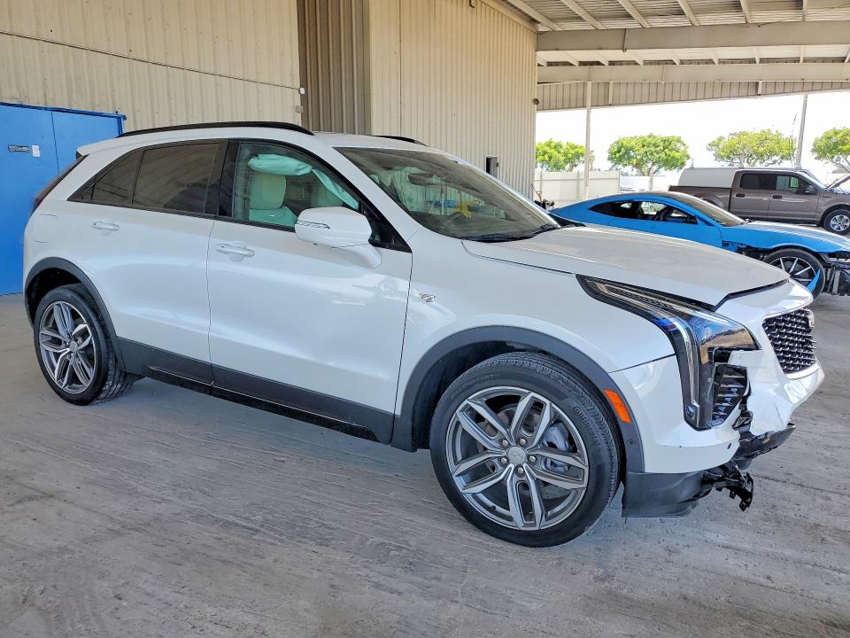 2023 Cadillac Xt4 VIN 1GYFZER4XPF101745 COPART salvage auction — FRONT END, Fl - Cert Of Title Slvg Rebuildable, sold $7,700 on 2026-08-19 (photo 4)