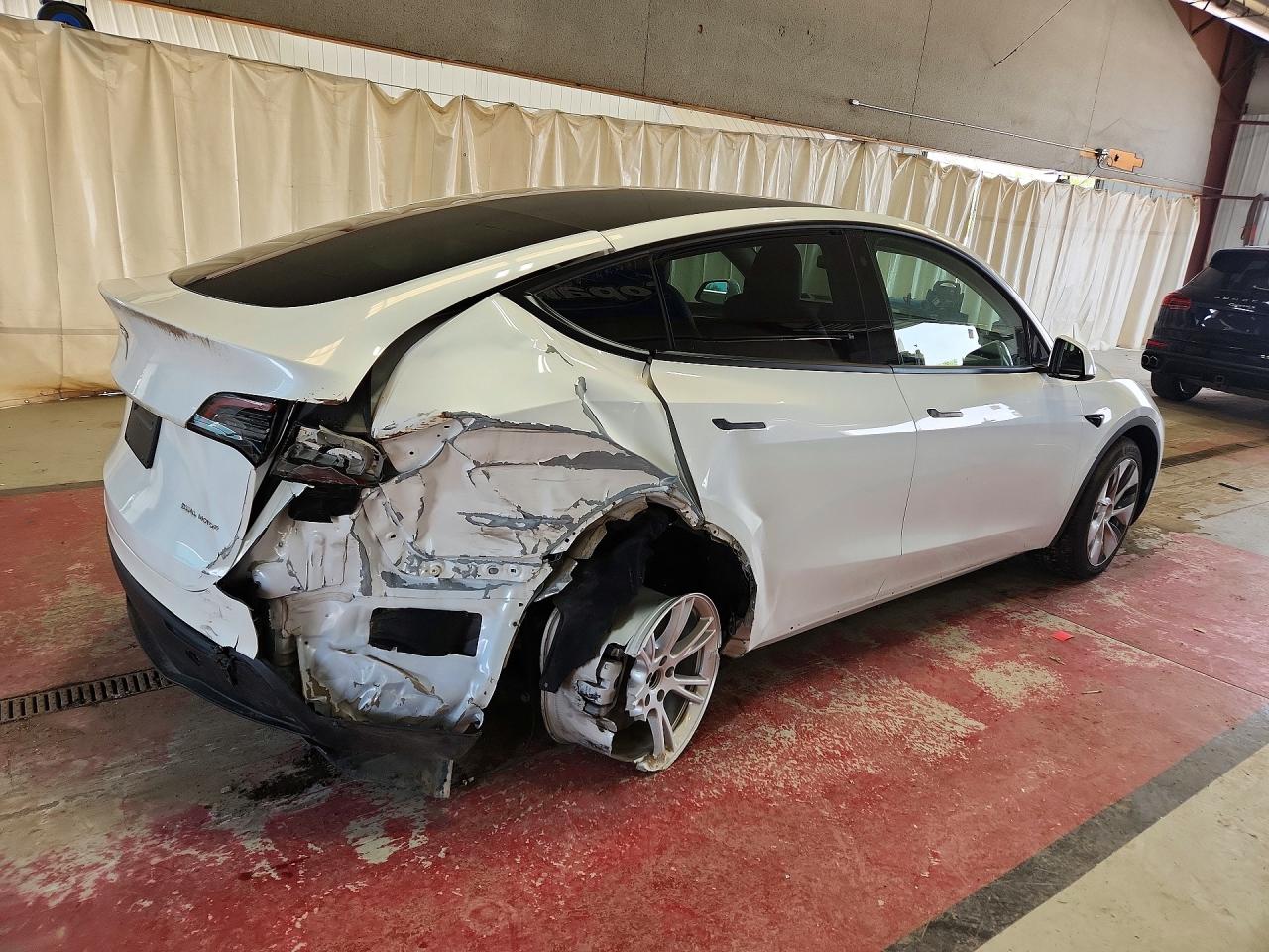 2023 Tesla Model Y VIN 7SAYGDEE7PF606971 COPART salvage auction — Rear End, NY - MV-907A SALVAGE CERTIFICATE, sold $8,900 on 2026-07-06 (photo 3)