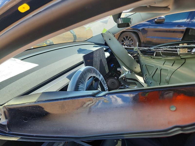 2026 Tesla Model y VIN 7SAYGDEE1TF413984 COPART salvage auction — ALL OVER, CO - SALVAGE TITLE, sold $14,800 on 2026-07-29 (photo 9)